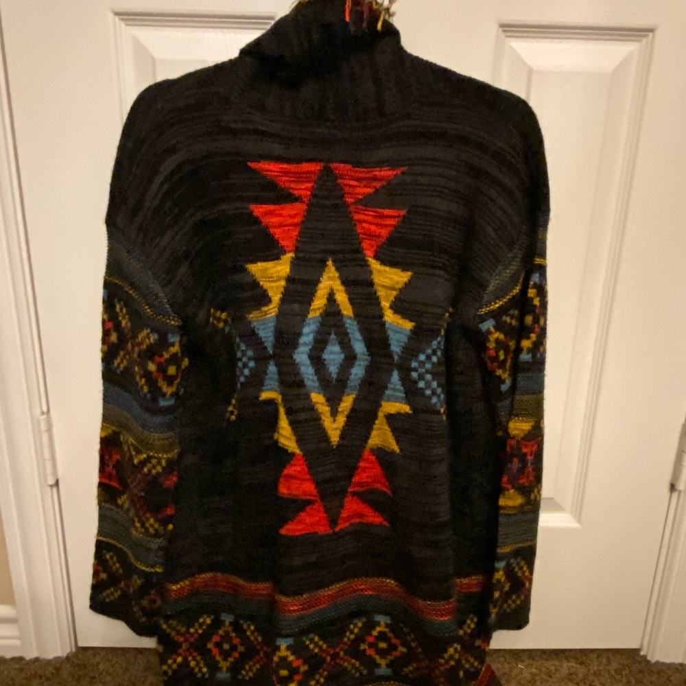 Multi color Small Sweater. It’s brand new ! I never wore it . Runs big .
